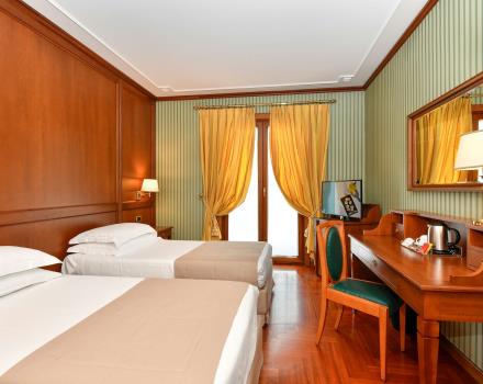 Travelling to Naples with your family? Choose the unique comfort of the Family rooms of Hotel Ferrari! Find out the details!
