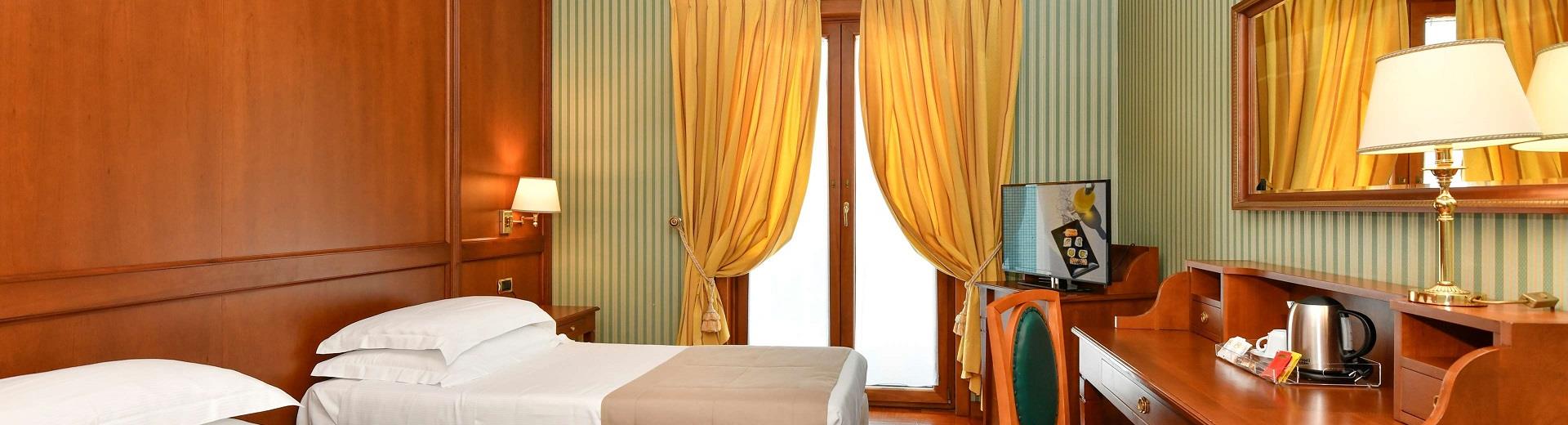 Viaggi a Napoli con la tua famiglia? Scegli il comfort unico delle camere Family di Hotel Ferrari! Scopri i dettagli!